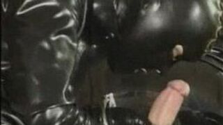 Rubber couple sucking - porn video