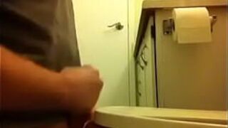 Toilet seat ballbusting - porn video